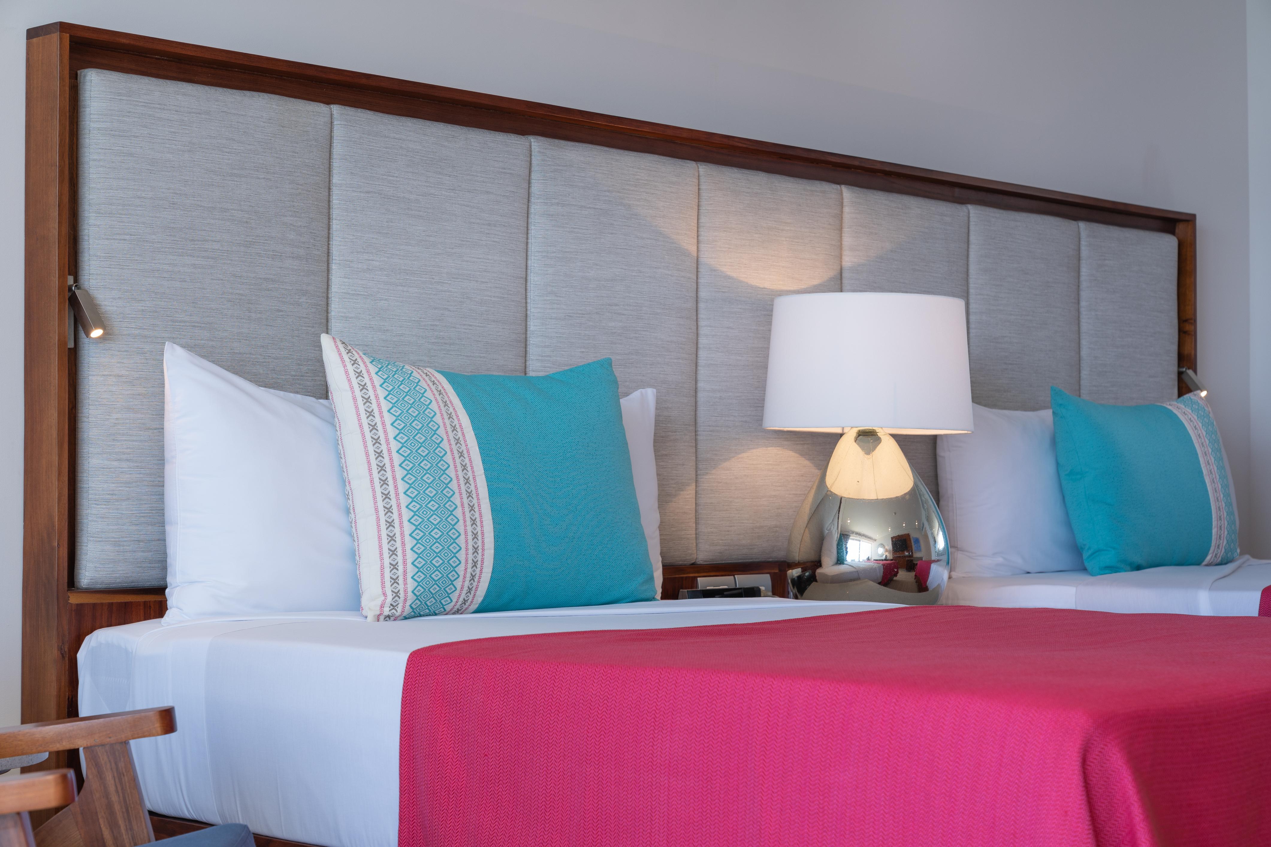 Grand Park Royal Puerto Vallarta Exterior photo A bed with a headboard