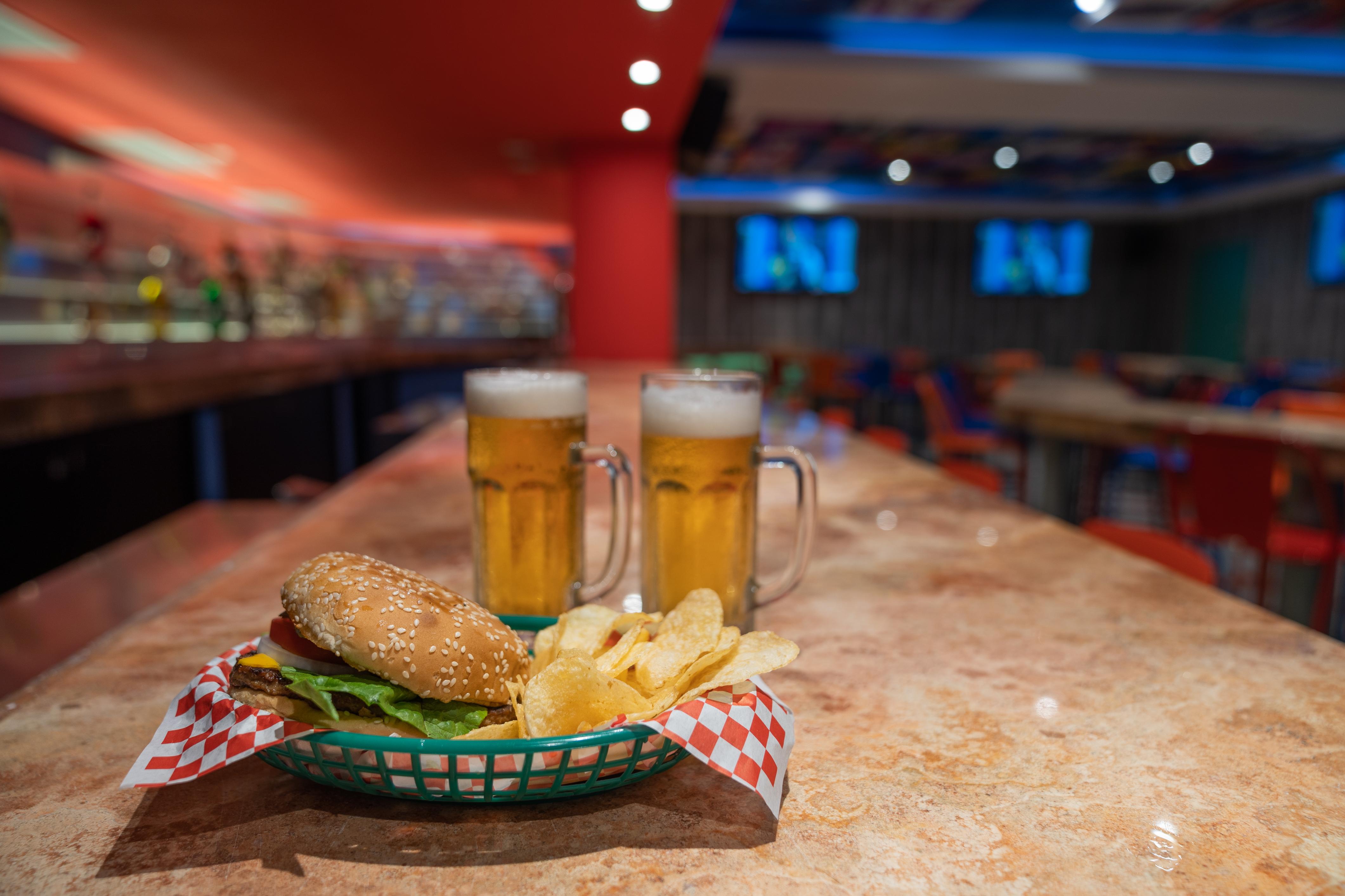 Grand Park Royal Puerto Vallarta Exterior photo A hamburger and chips with two beers