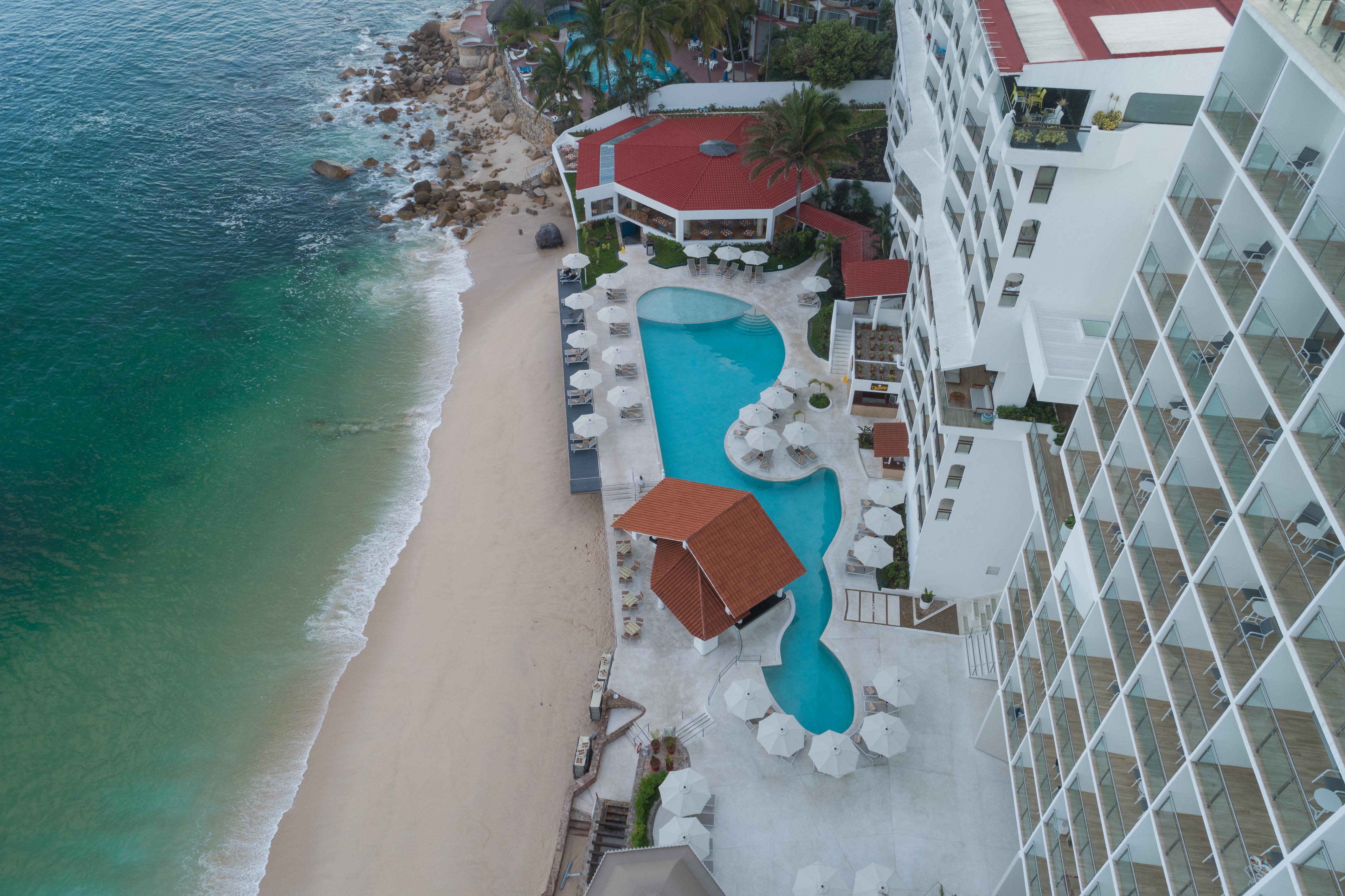 Grand Park Royal Puerto Vallarta Exterior photo Aerial view of the pool at the Grand Hotel
